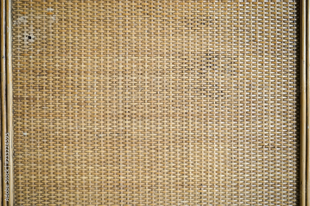 Bamboo woven surface. A closed up of wooden closet made from bamboo woven.