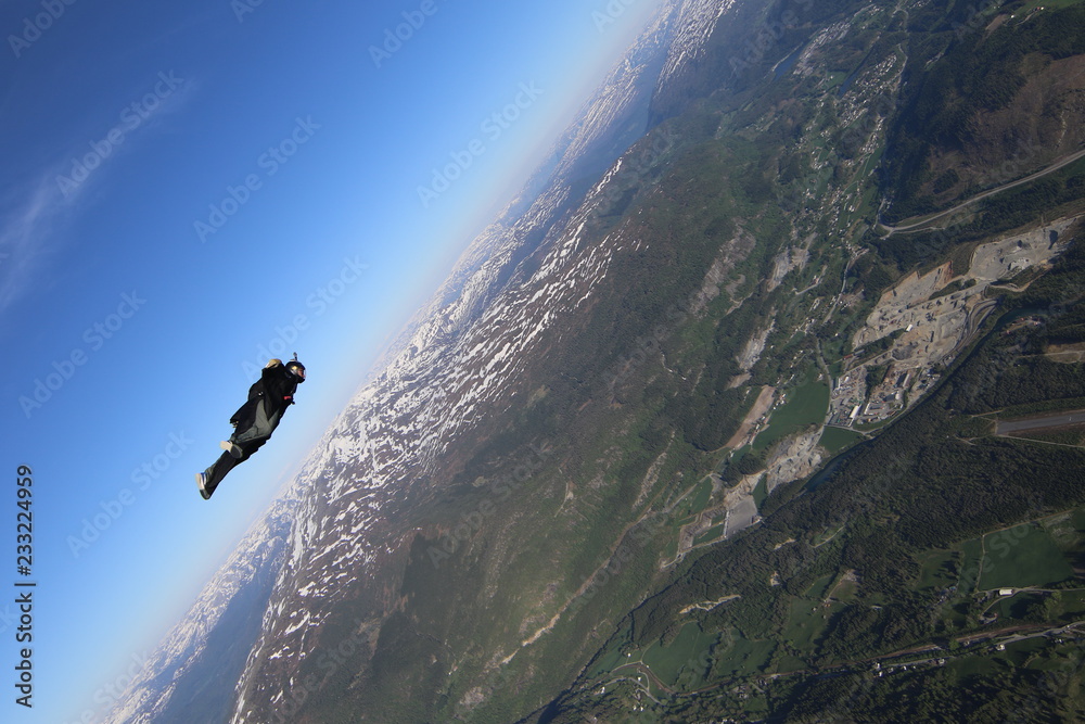 Obraz premium Wingsuit skydiving over Norway