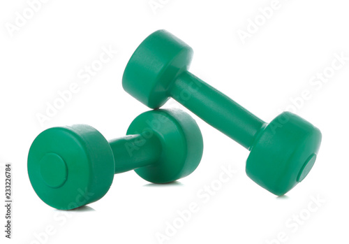 Dumbbells for fitness green on a white isolated background. Sport equipment