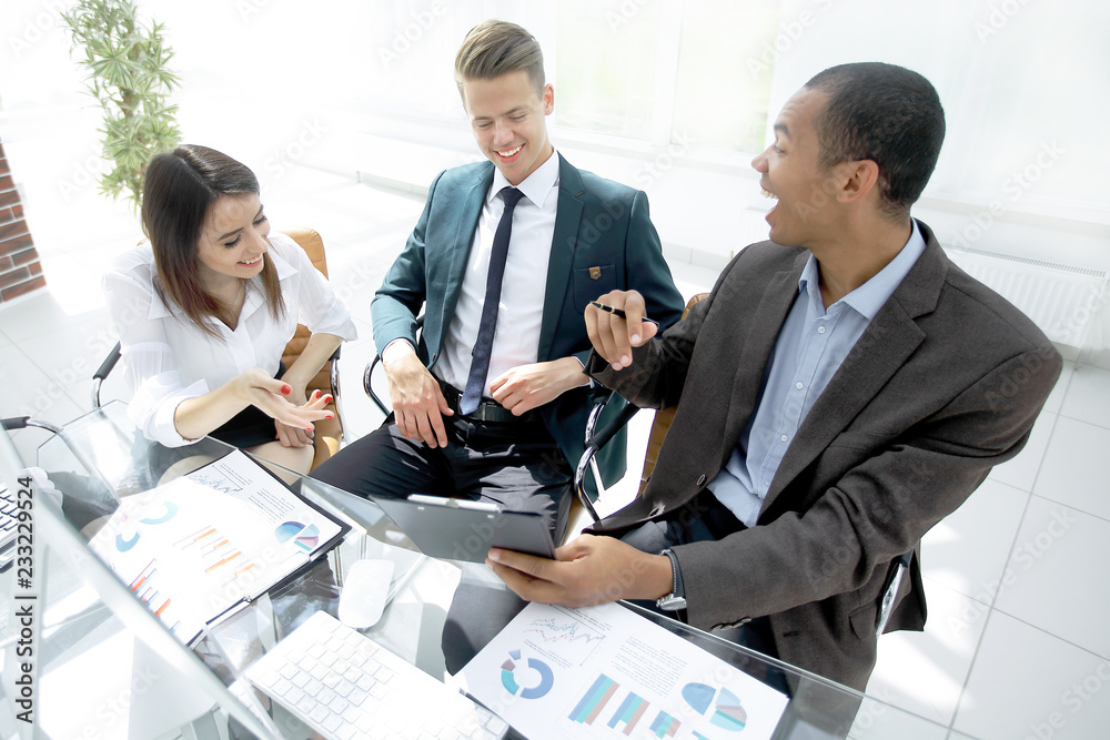 successful business team discussing the financial profit of the company successful business team discussing the financial profit of the company