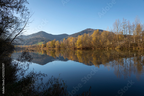 autumn on mur river near village deutschfeistritz in styria, austria