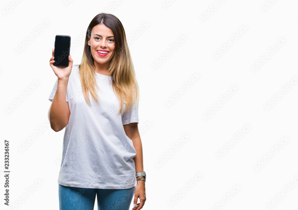 Young beautiful woman showing blank screen of smartphone over isolated background with a happy face standing and smiling with a confident smile showing teeth Young beautiful woman showing blank screen of smartphone over isolated background with a happy face standing and smiling with a confident smile showing teeth