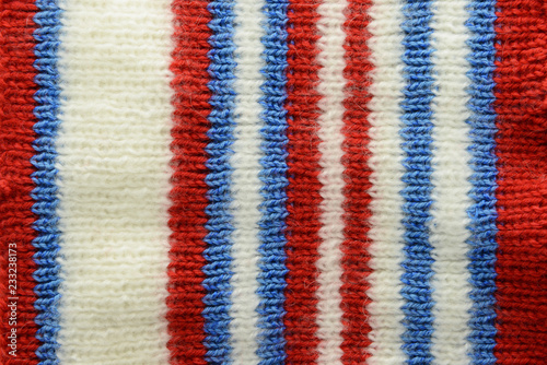 knitted textile background full frame in red white blue color