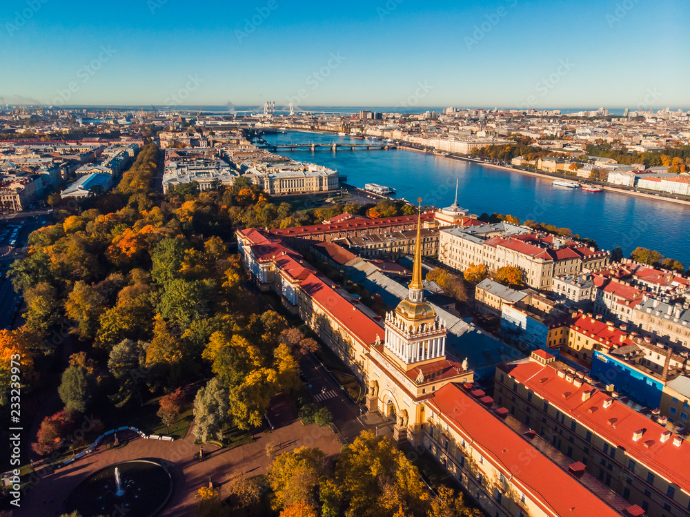 Autumn cityscape top view aerial dron, yellowed foliage in Park near main Admiralty of St. Petersburg