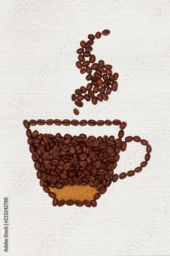 Cup of coffee made of beans on canvas background.