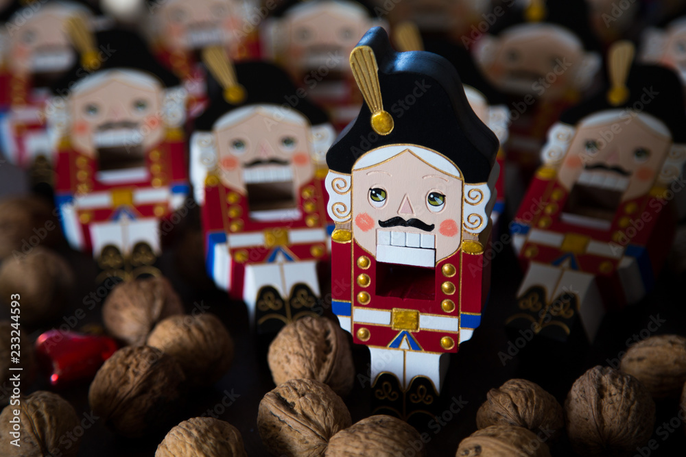 Traditional Christmas decoration handmade wooden nutcracker from classical Tchailovsky ballet, Christmas concept background Traditional Christmas decoration handmade wooden nutcracker from classical Tchailovsky ballet, Christmas concept background
