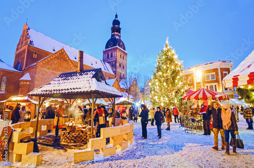 Photography People enjoy Christmas market Riga