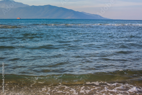 Landscape from the beach of Keramoti overlooking the island of Thassos, northern Greece.