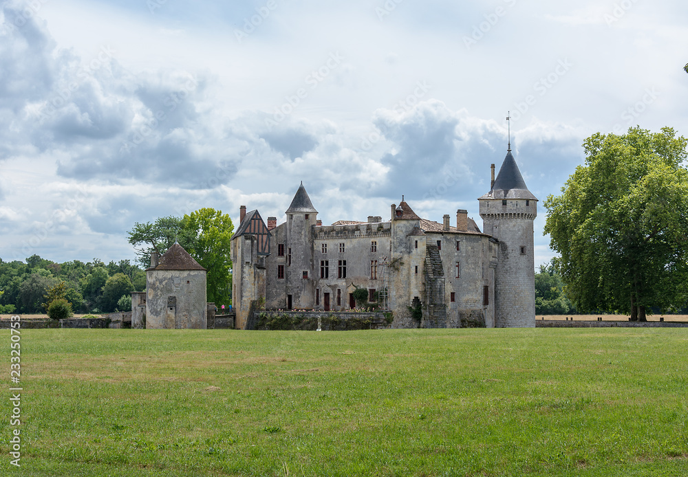 The Chateau de La Brede is a feudal castle in the commune of La Brede in the departement of Gironde, France. Summer cloudy day