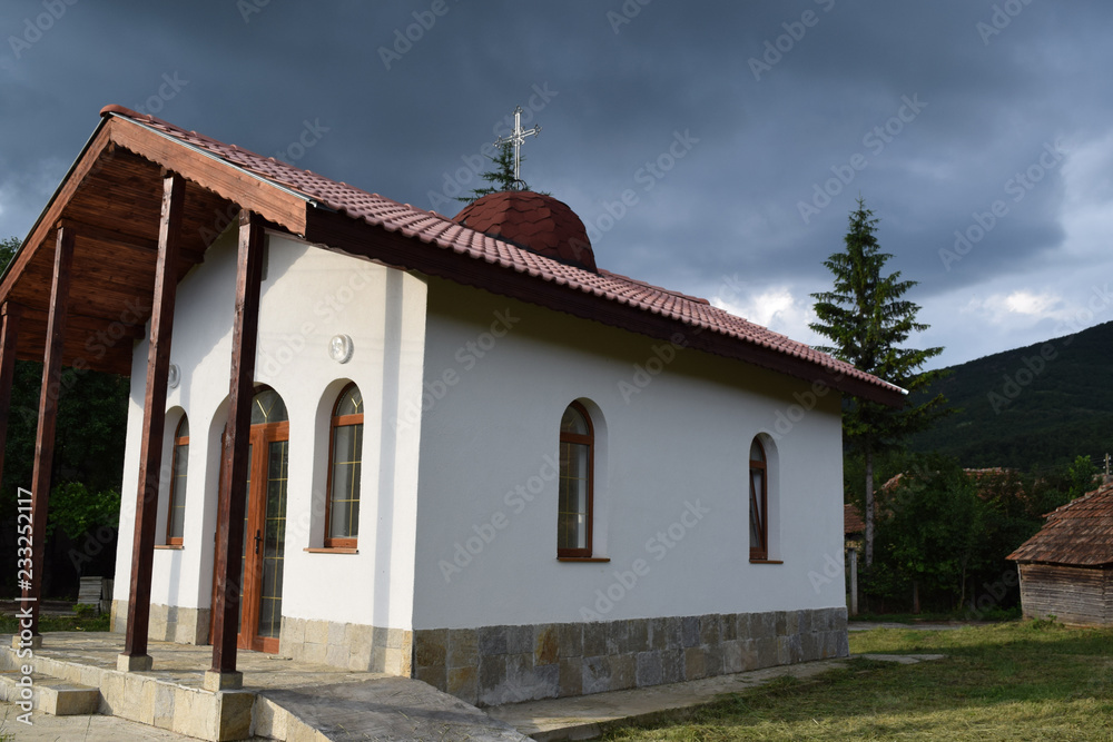 Storm Cloud behind a Small Church