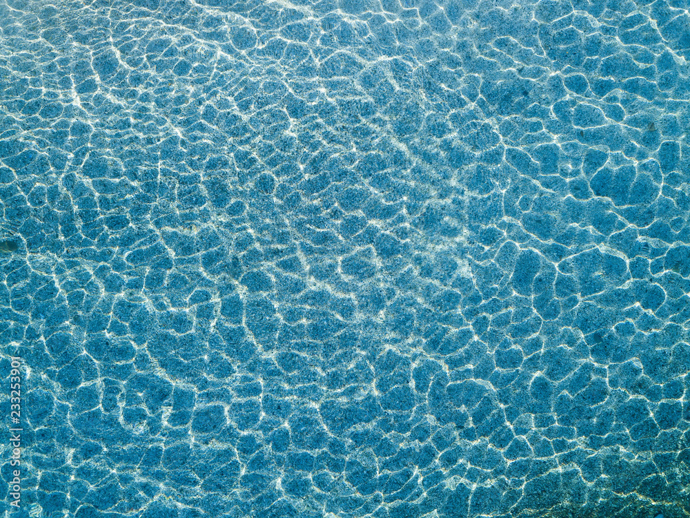 Aerial view of water reflections on the sea