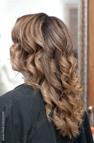 hairstyle female curls on dark hair