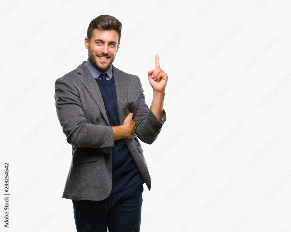 Young handsome business man over isolated background with a big smile on face, pointing with hand and finger to the side looking at the camera. Young handsome business man over isolated background with a big smile on face, pointing with hand and finger to the side looking at the camera.