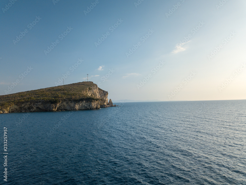 Cliff side located in Himara, Albania at sunset Cliff side located in Himara, Albania at sunset