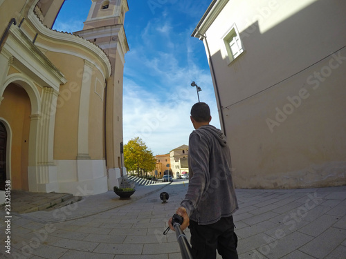 Man in a small square in Sardinia photo