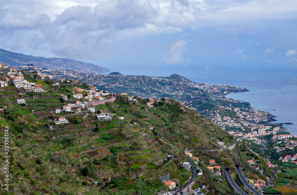 City on the hilly coast of Madeira Island, Portugal.