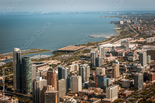 Aerial view looking out over the south shore of Chicago Illinois with the steel mills of Gary Indiana in the distance