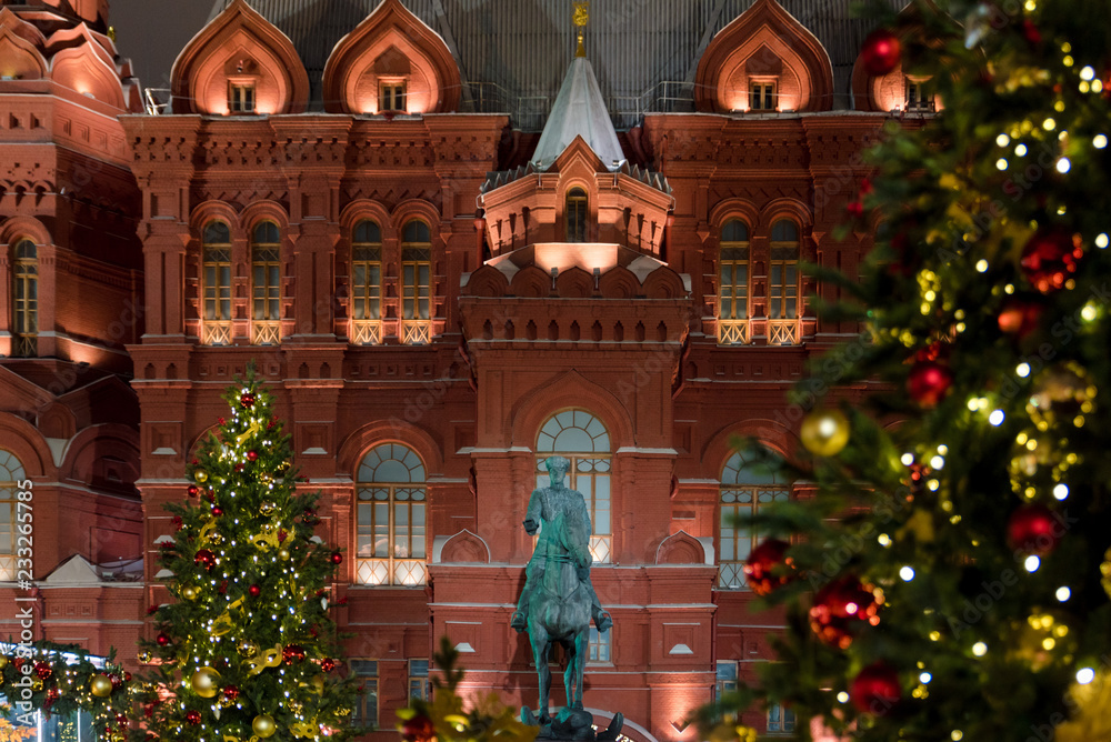 Historical museum. Monument to Zhukov. Okhotny Ryad. Decorations for the New year. Winter evening. Moscow. Russia.