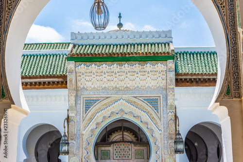 Arch of the mosque university of Fes medina, Morocco photo