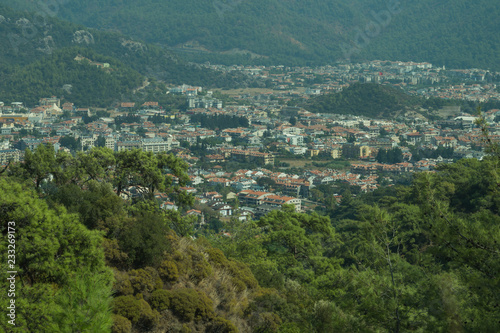 Mountain town panoramic view. city between the hills