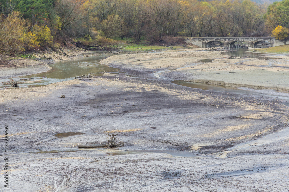 View of Barrea Lake almost dry, Lake Barrea, Abruzzo, Italy. October 13, 2017