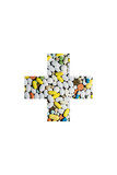 colored pills for treatment of diseases in the form of a medical cross