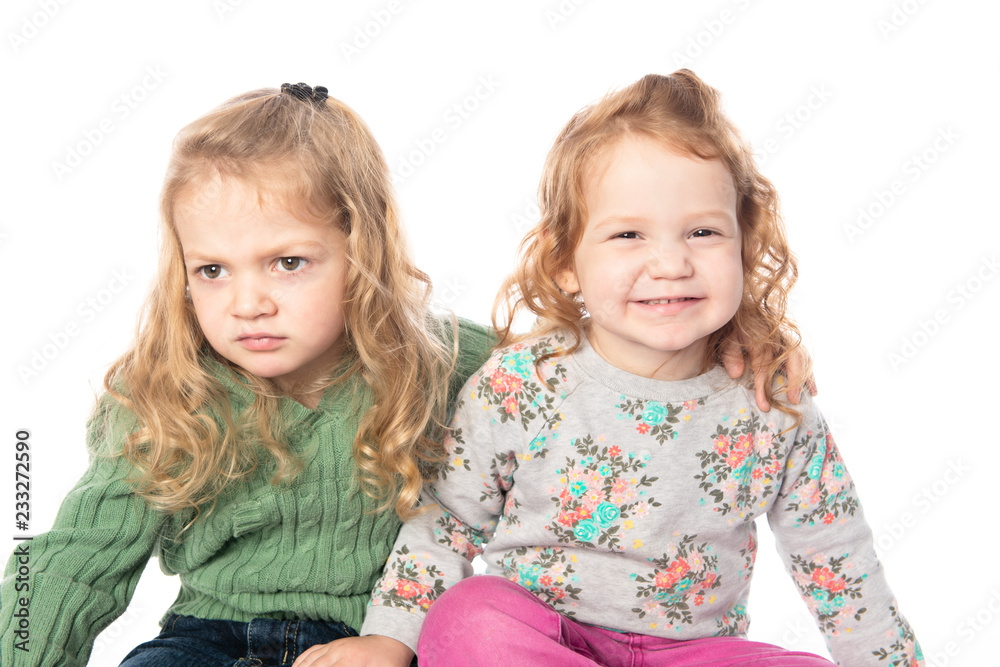 Cute sister Little Girl with redhead in studio white background