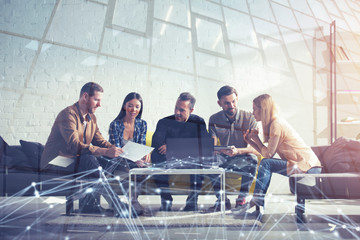 Business people connected on internet network with a laptop. concept of startup company. double exposure