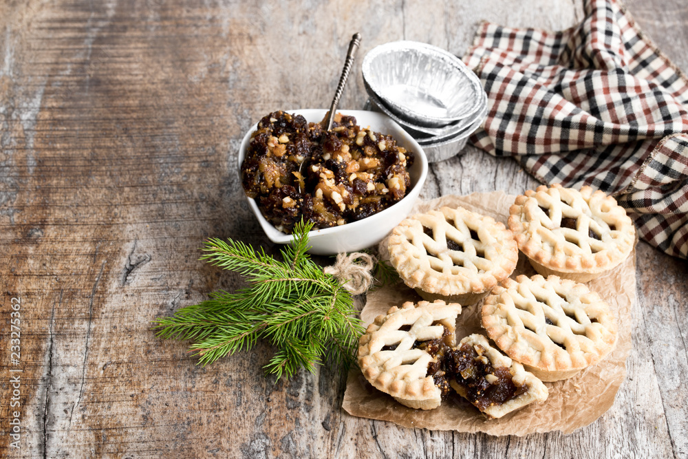 Mince pie group on wooden table Mince pie group on wooden table
