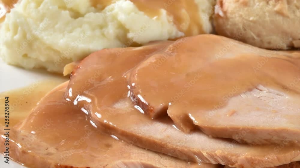 Gourmet sliced turkey with mashed potatoes and gravy
Gourmet sliced turkey with mashed potatoes and gravy