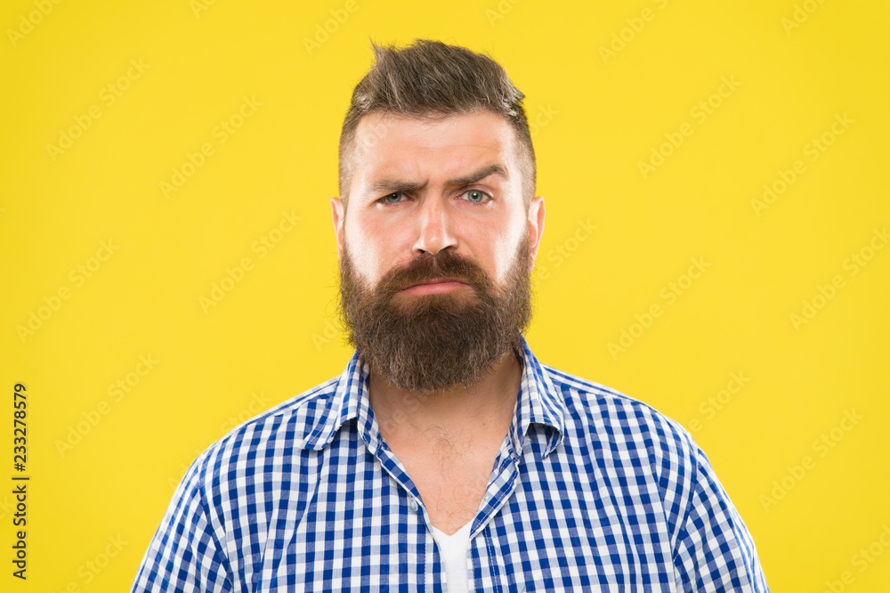 Are you serious. Man serious face raising eyebrow not confident. Have some doubts. Hipster bearded face not sure in something. Doubtful bearded man on yellw background close up. Doubtful expression Are you serious. Man serious face raising eyebrow not confident. Have some doubts. Hipster bearded face not sure in something. Doubtful bearded man on yellw background close up. Doubtful expression