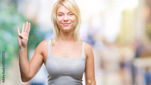 Young beautiful blonde woman over isolated background showing and pointing up with fingers number four while smiling confident and happy. Free Download Young beautiful blonde woman over isolated background showing and pointing up with fingers number four while smiling confident and happy. - GFXLoad