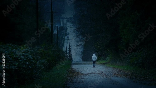 Man Walks In Darkened Landscape - Depression, Loneliness Concept