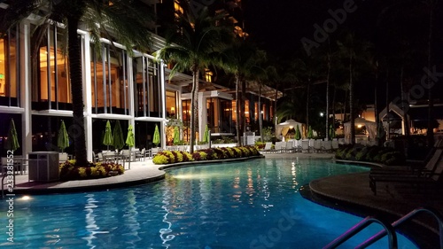 Luxury Swimming Pool at Night, With Backlit Landscaping