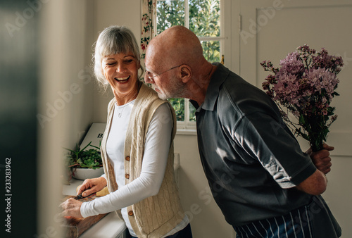 Konstfotografi Romantic senior couple at home having fun
