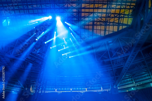 Spotlights shine blue. Ligh...