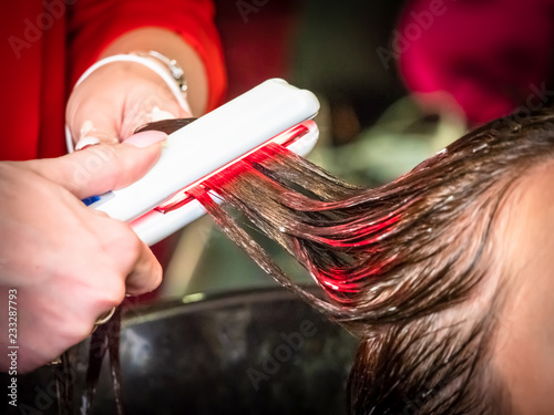 Hair treatment. The girl ha...