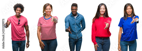 Composition of african american, hispanic and chinese group of people over isolated white background smiling friendly offering handshake as greeting and welcoming. Successful business.