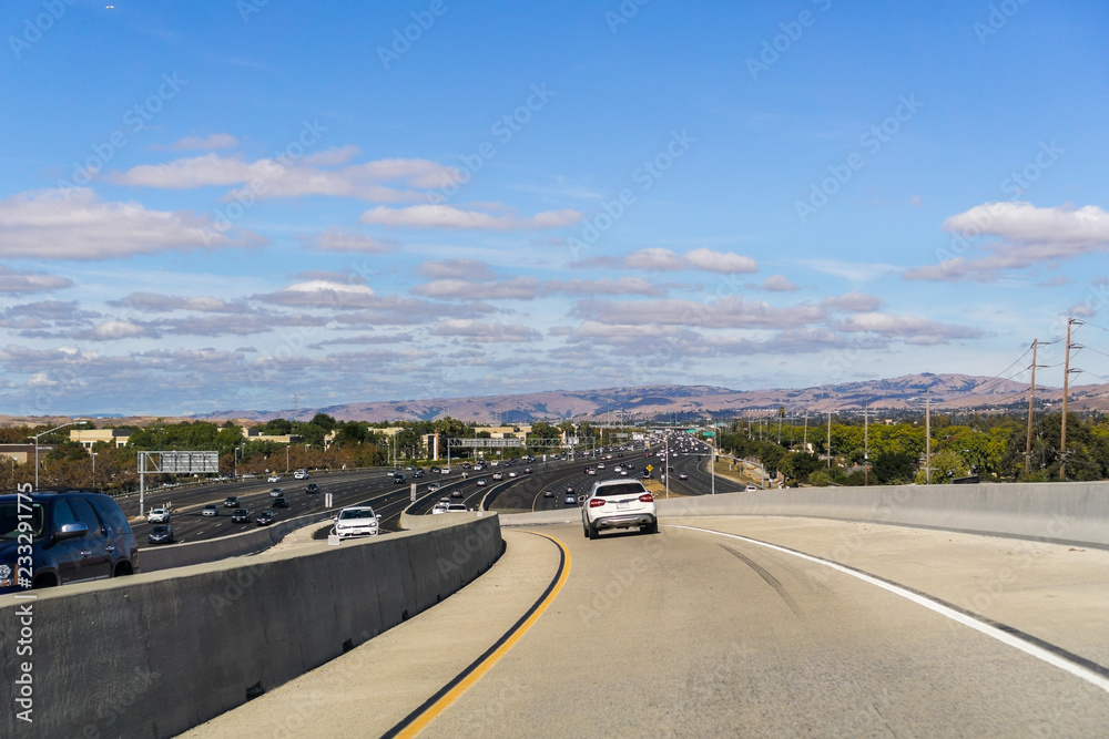 Fototapeta premium Driving on the express lane to switch between highways; Highway 880 visible in the background, south San Francisco bay, California