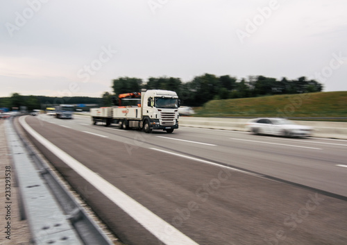 Blurred motion truck moving with high speed