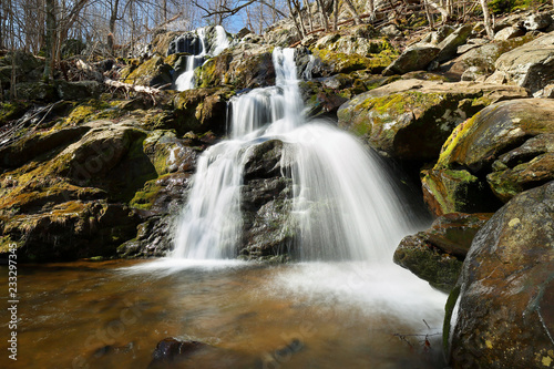 Slow motion of Dark Hollow water falls on a sunny day in Shenandoah National Park, Virginia, USA 