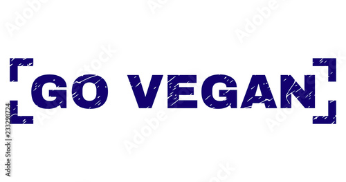 GO VEGAN tag seal print with grunge texture. Text label is placed between corners. Blue vector rubber print of GO VEGAN with corroded texture.