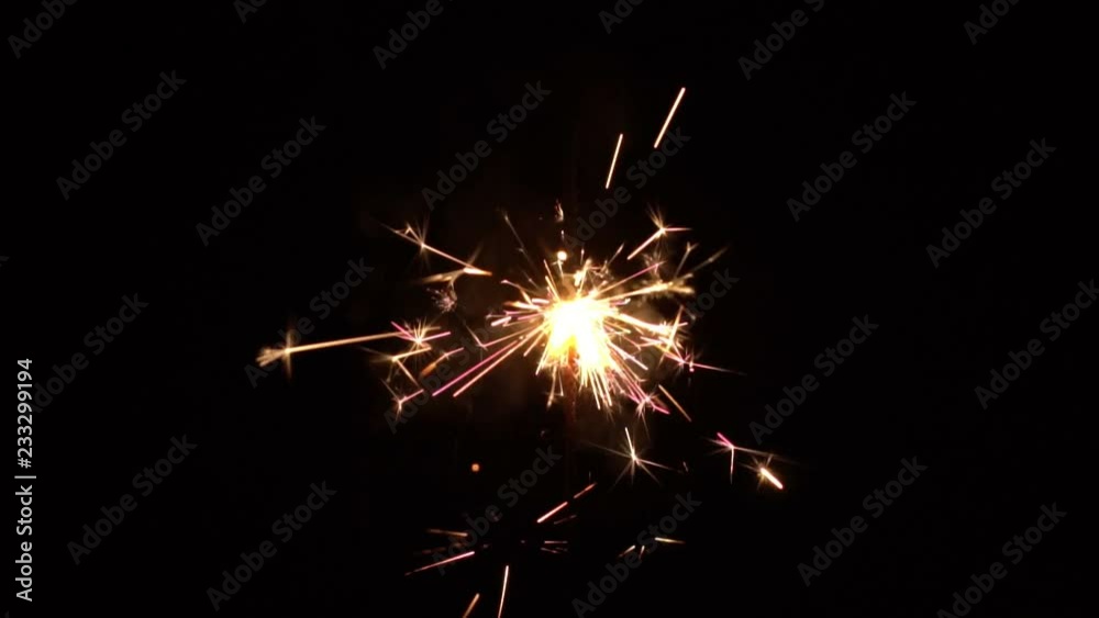 Sparks and festive fires on a black background. Fireworks Christmas. Sparks and festive fires on a black background. Fireworks Christmas.