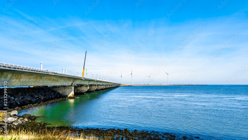 Fototapeta premium The concrete structure Storm Surge Barrier built in the province of Zeeland, in the Netherlands to prevent flood disasters as that in 1953