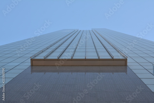 Looking up from the bottom of a glass building