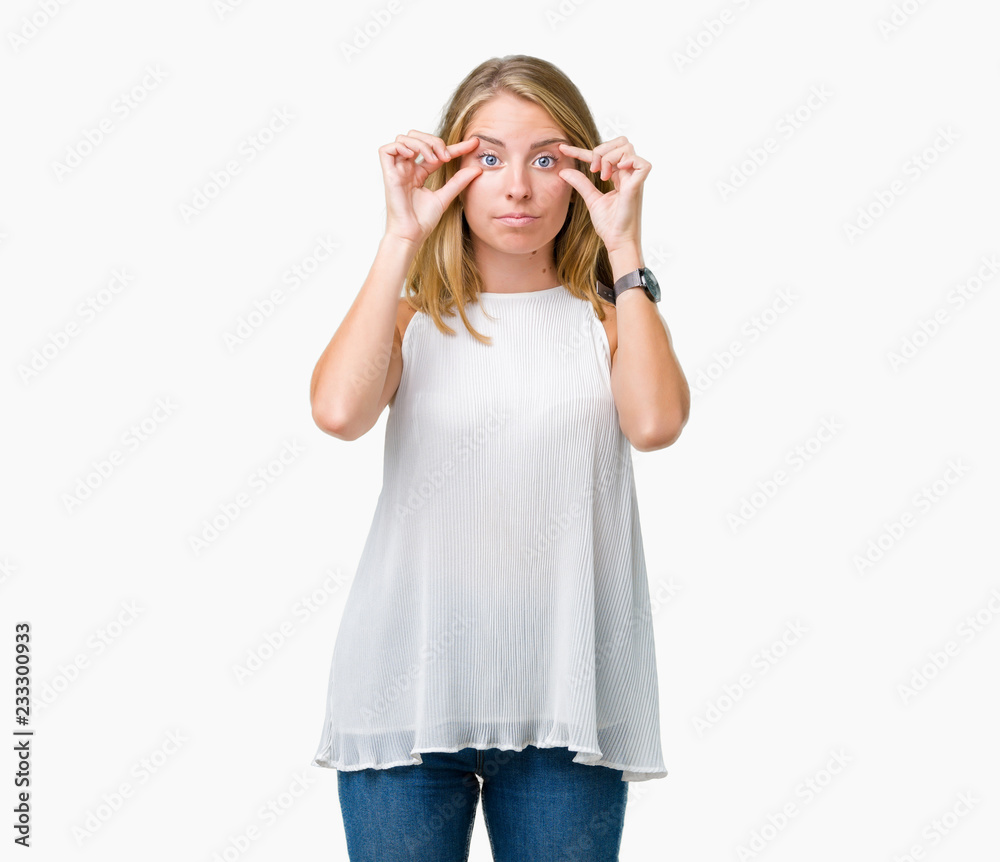 Beautiful young elegant woman over isolated background Trying to open eyes with fingers, sleepy and tired for morning fatigue Beautiful young elegant woman over isolated background Trying to open eyes with fingers, sleepy and tired for morning fatigue