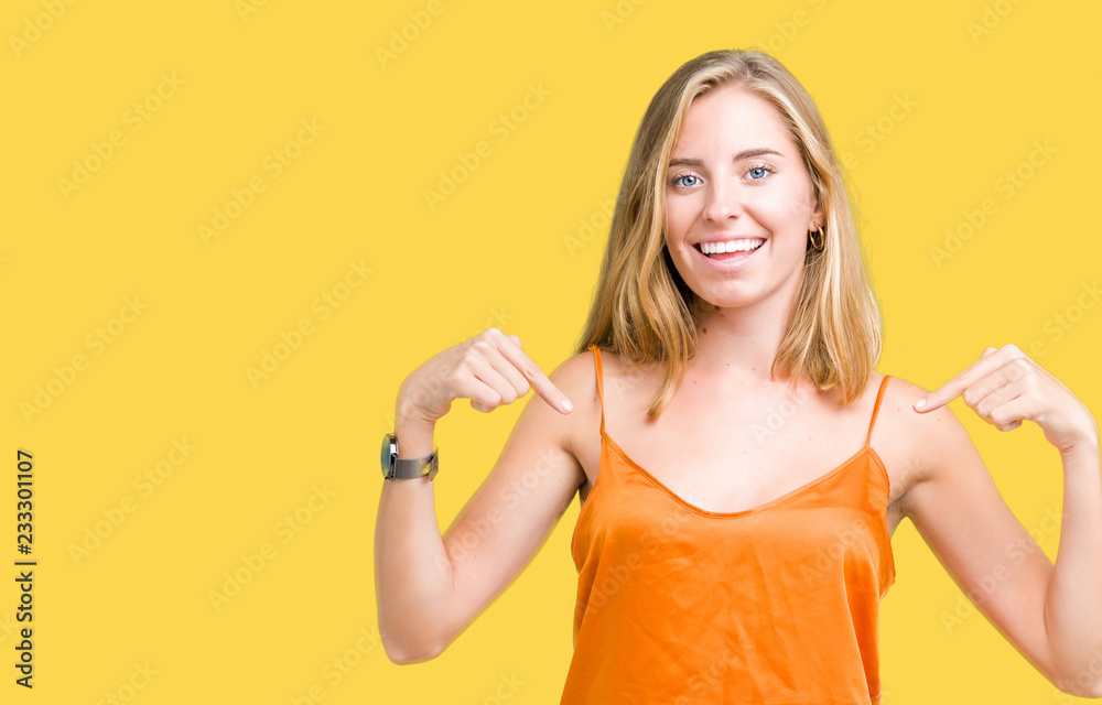 Beautiful young woman wearing orange shirt over isolated background looking confident with smile on face, pointing oneself with fingers proud and happy. Beautiful young woman wearing orange shirt over isolated background looking confident with smile on face, pointing oneself with fingers proud and happy.