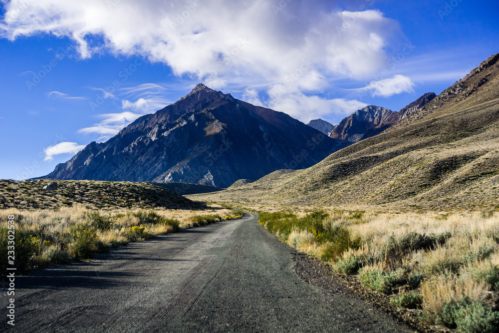 Driving on a narrow mountain road towards the Eastern Sierra mountains, California
