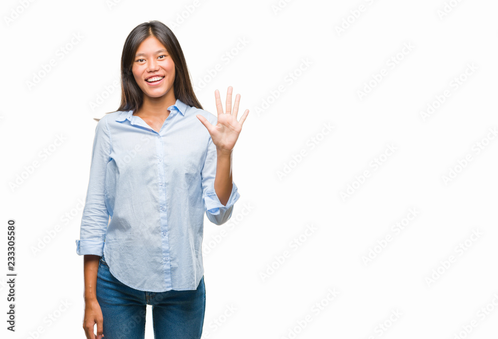 Young asian business woman over isolated background showing and pointing up with fingers number five while smiling confident and happy. Young asian business woman over isolated background showing and pointing up with fingers number five while smiling confident and happy.