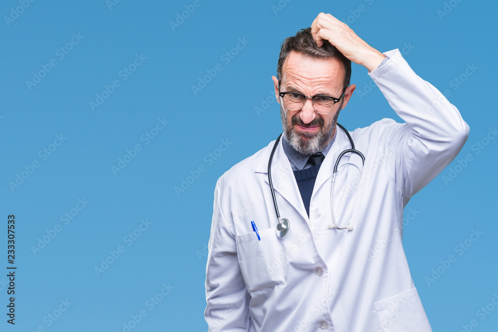 Middle age senior hoary doctor man wearing medical uniform isolated background confuse and wonder about question. Uncertain with doubt, thinking with hand on head. Pensive concept. Middle age senior hoary doctor man wearing medical uniform isolated background confuse and wonder about question. Uncertain with doubt, thinking with hand on head. Pensive concept.